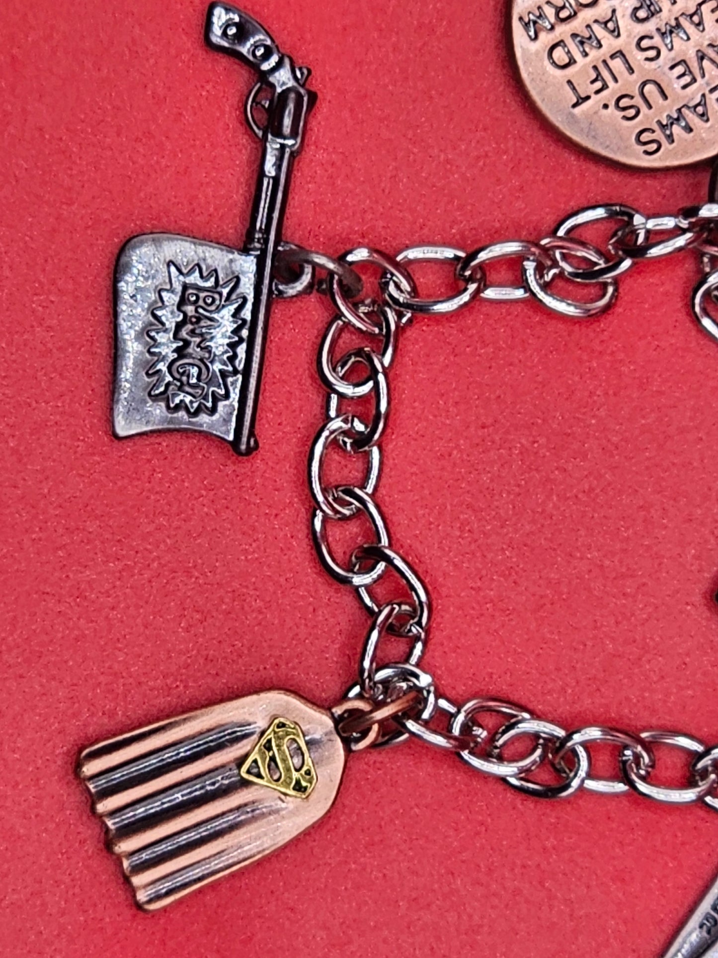 DC themed metal bracelet 4 piece charm