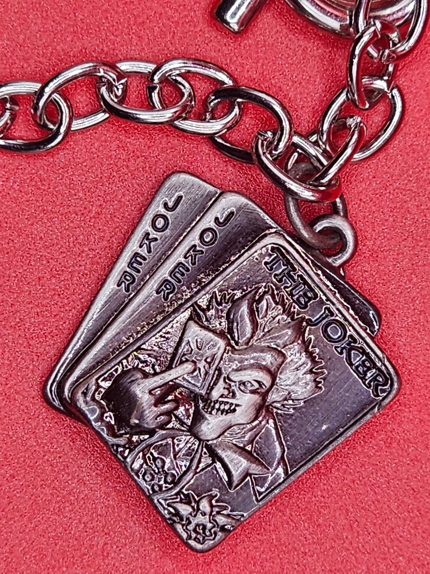 DC themed metal bracelet 4 piece charm